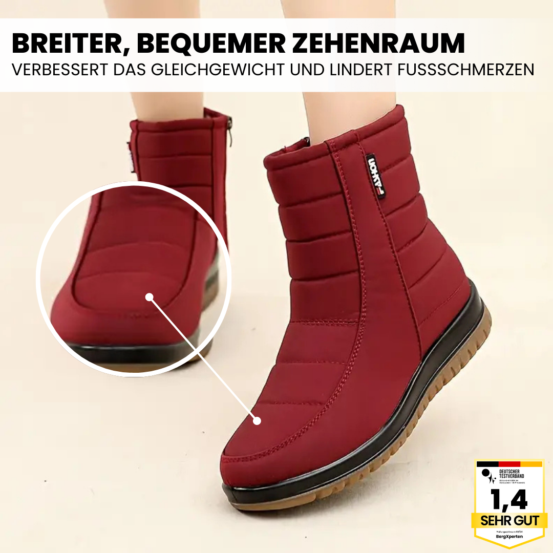 "Wasserdichte, braune Damenstiefel mit rutschfester Sohle für Herbst und Winter, isoliert gegen Kälte."