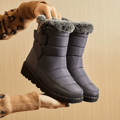 "Wasserdichte Damen-Winterstiefel, elegant, rutschfeste Sohle, warm gefüttert, ideal für Schnee und Regen."