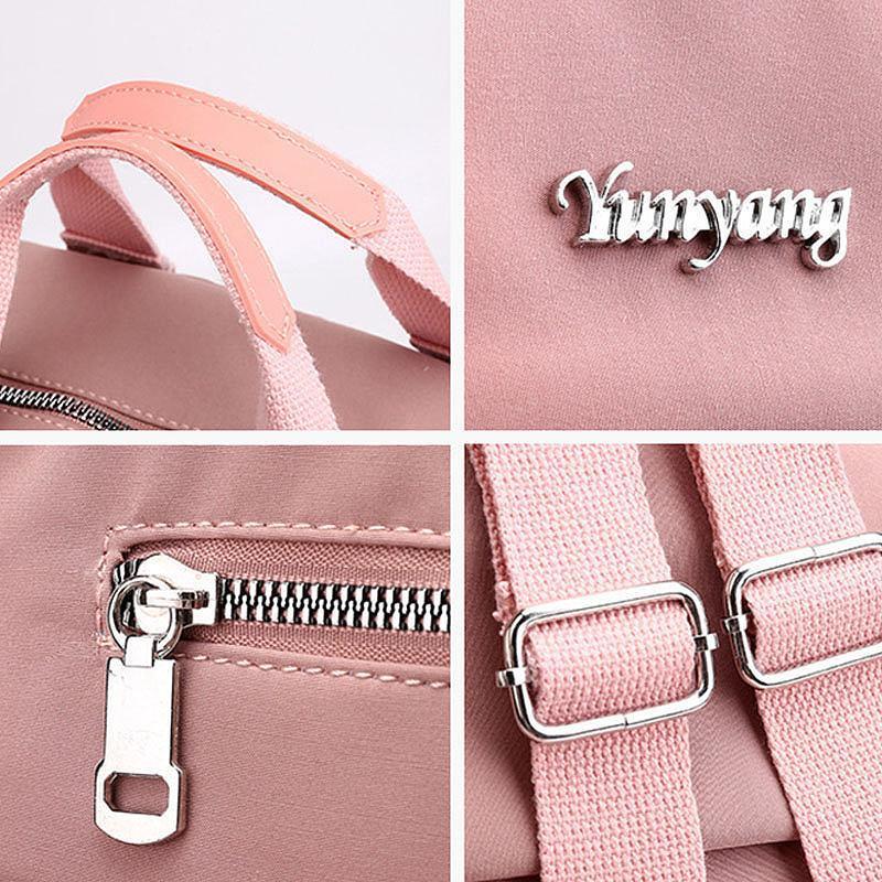 "Wasserfester Rucksack mit USB-Ladung, große Kapazität, schwarz, Vorderansicht; ideal für Reisen und Alltag."