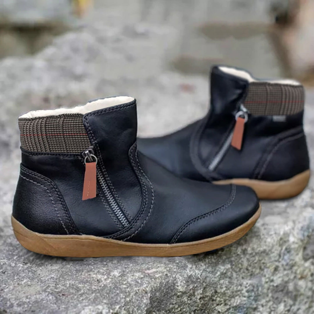 Stylish women's waterproof ankle boots with durable traction sole, ideal for rain, snow, & outdoor wear.