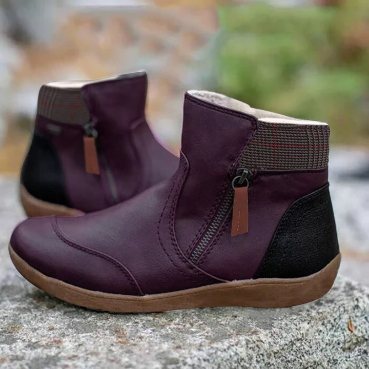 Comfortable & fashionable women's waterproof ankle boots, designed for urban exploration & wet conditions.