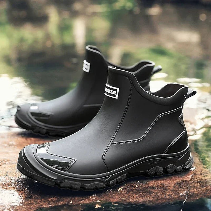 Women's waterproof Chelsea boots, perfect for rain. Stylish slip-on ankle footwear for all-weather comfort.