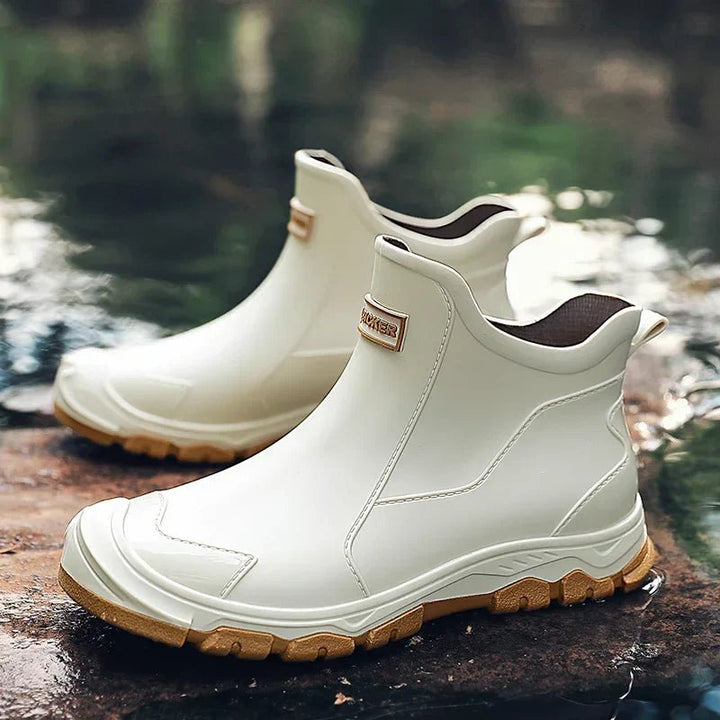 Slip-on waterproof women's Chelsea boots. Durable ankle rain boots for outdoor comfort & wet weather.