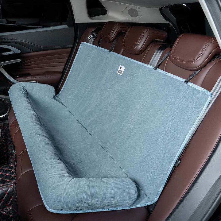 Dog happy in car seat cover, comfortable travel bed, car protection