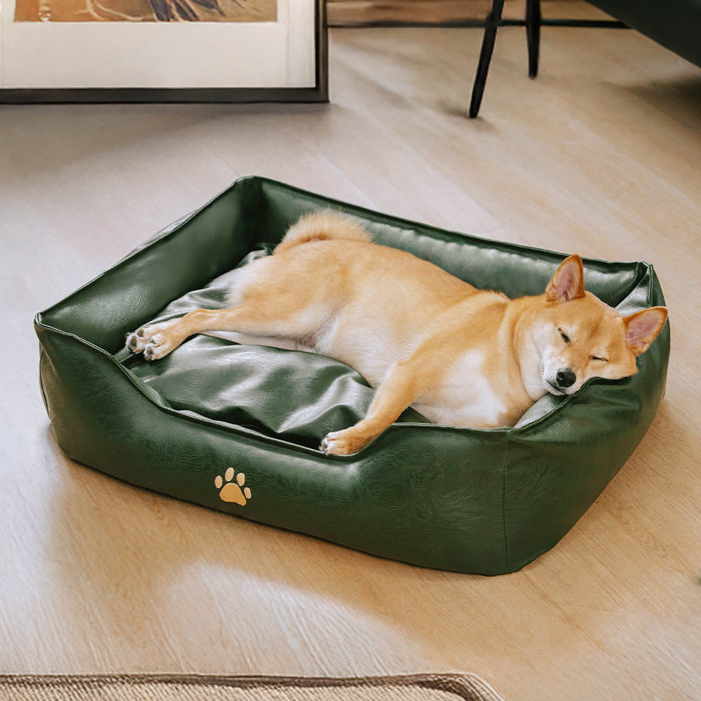 Instructional image showing how to clean a waterproof faux leather pet sofa bed, washable dog bed