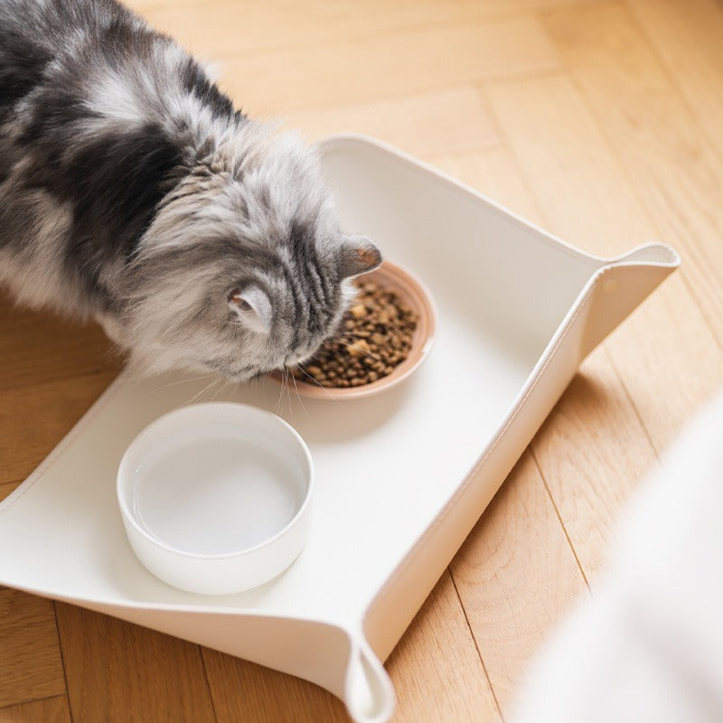 Non-slip pet feeding mat to contain spills from dog and cat food and water bowls, grey.