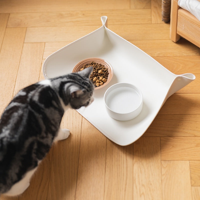 Durable grey pet feeding mat, spill-proof and waterproof, ideal for dogs and cats' meal times.