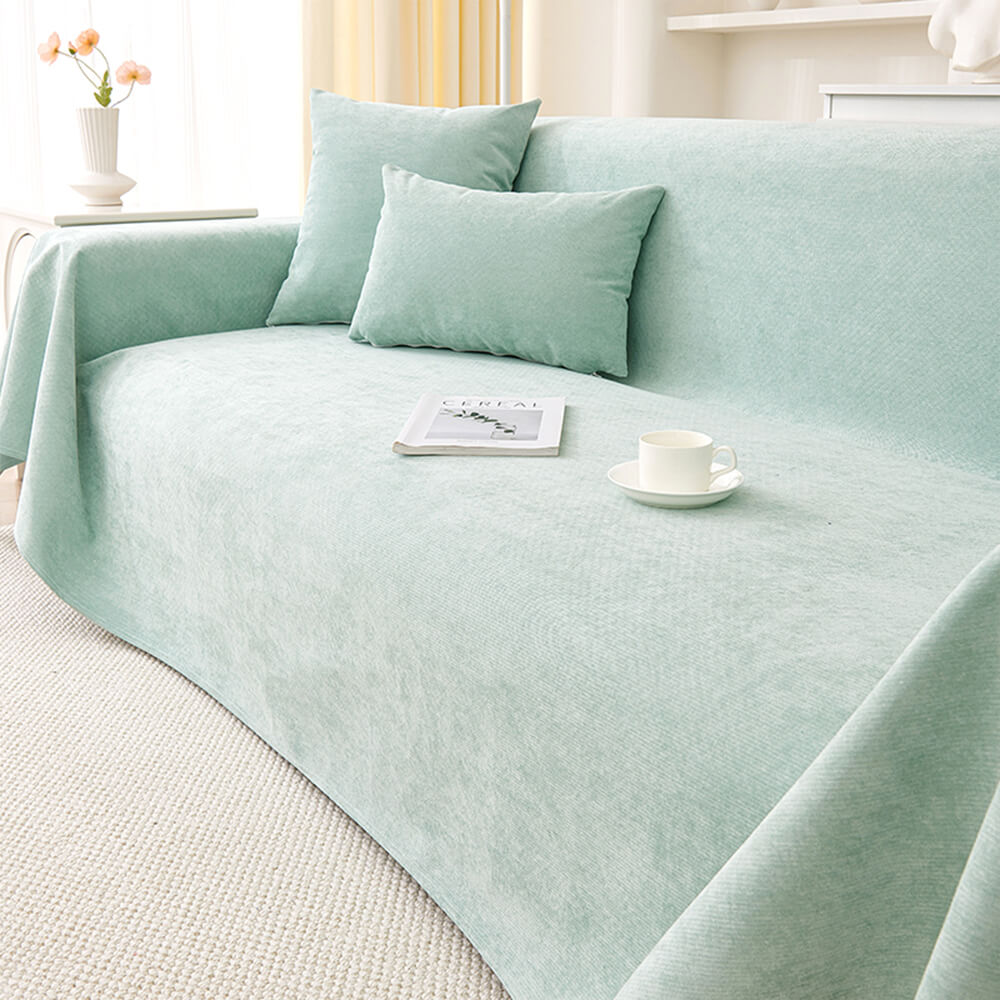 Side view of a couch with a fitted non-slip waterproof pet-friendly scratch-resistant sofa protector