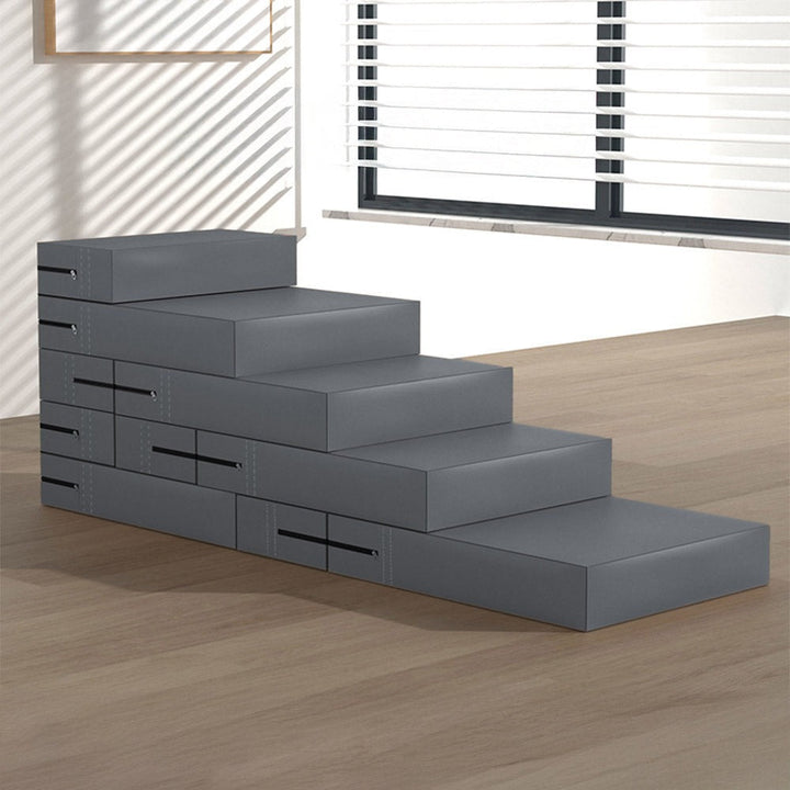 Dog climbing up 3-step waterproof PU leather pet stairs, aiding access to a sofa or bed