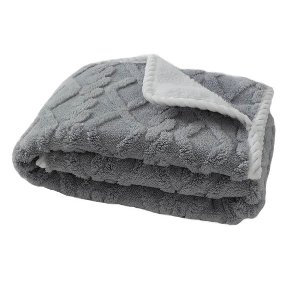 Gray waterproof pet blanket folded neatly, highlighting its soft fleece material suitable for dogs and cats, washable