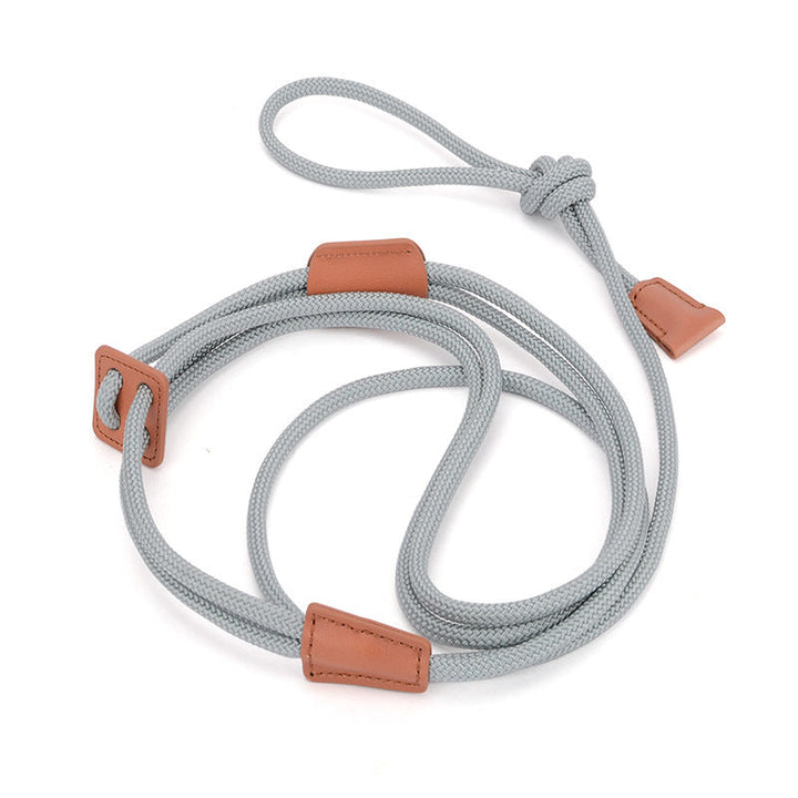 Gray durable nylon leash, weatherproof, for dog training and outdoor pet activities. Strong and lightweight.