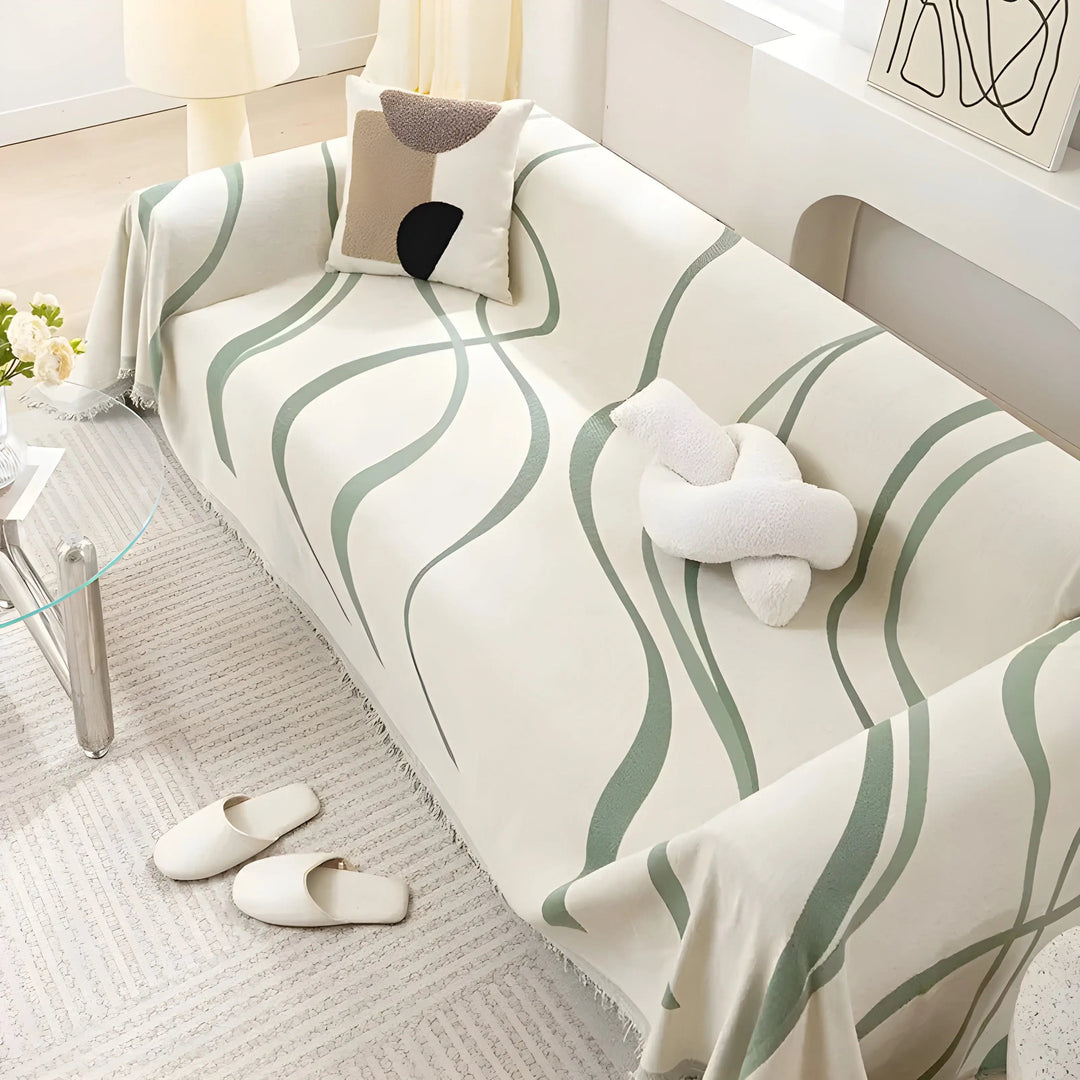 "Wendbarer Sofabezug aus Chenille & Baumwolle in Grau, elegantes Muster, schützt vor Flecken und ist pflegeleicht."