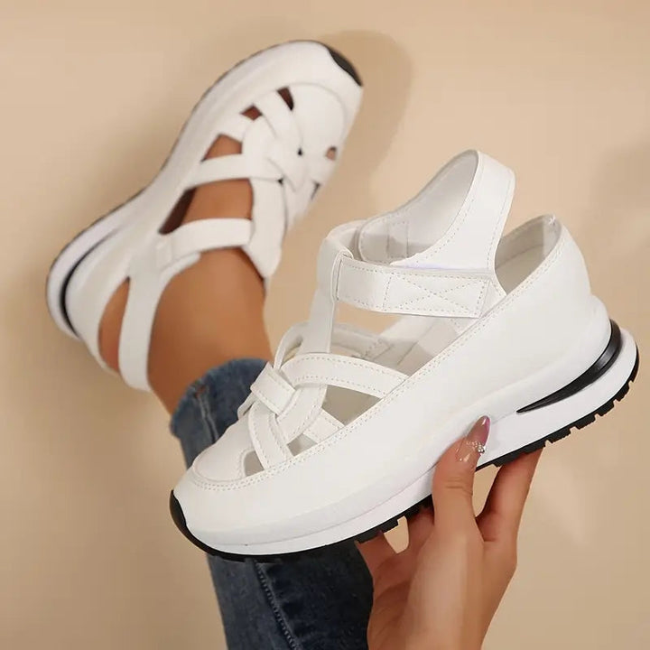 White women's cut-out flatform sport sandals with velcro ankle strap, perfect for summer casual wear.