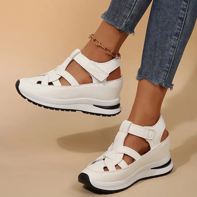 Comfortable women's sport flatform sandals in black with cut-out design & adjustable velcro strap for summer.