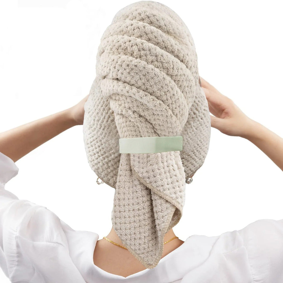 Plush microfiber hair towel wrap for quick drying, gentle hair care, and frizz reduction.