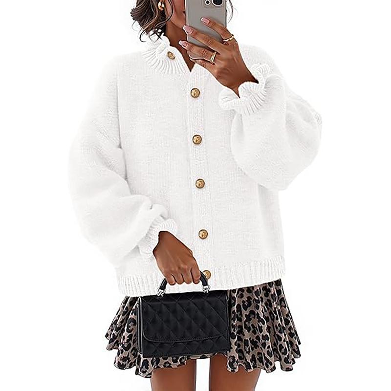 Classic women's buttoned cardigan with long sleeves. Chic, comfortable design for effortless, elegant layering.