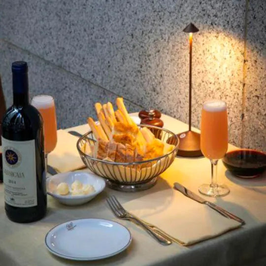 Dimmable wireless LED desk lamp. Modern, portable, and rechargeable for home decor & ambient lighting.