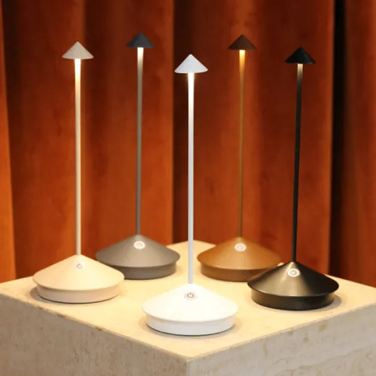 Sleek dimmable LED table lamp, wireless. Great for contemporary home decor, indoor accent lighting.