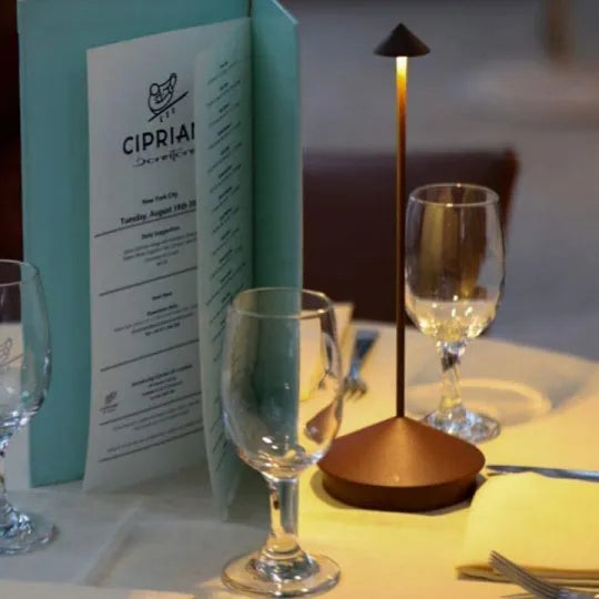 Contemporary wireless LED table lamp with dimmable light. Perfect for modern home decor ambiance.