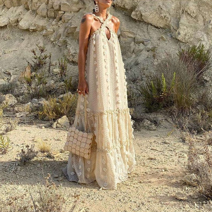 Woman wearing a flowy summer maxi dress, perfect for effortless style and comfort. Ideal for vacation or casual wear.