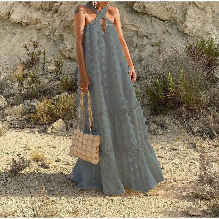 Front view of a beautiful women's flowy summer maxi dress, highlighting its comfortable, elegant, & versatile design.