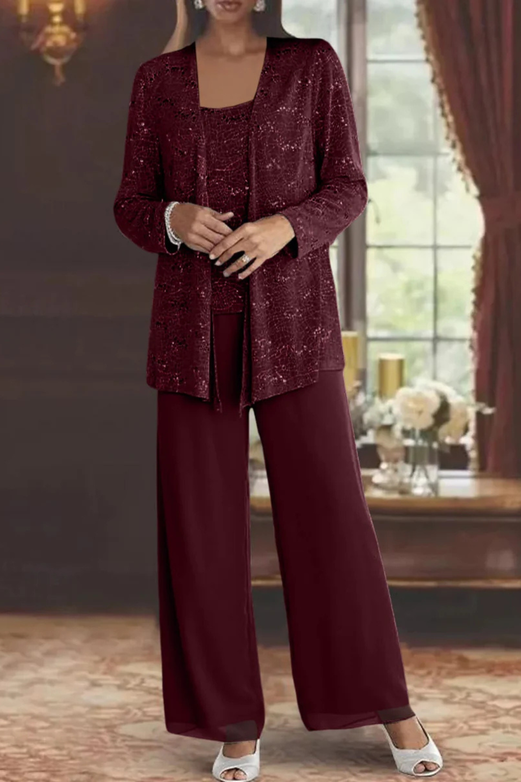 Modern women's three-piece formal evening set, elegant flowing design for a contemporary look.
