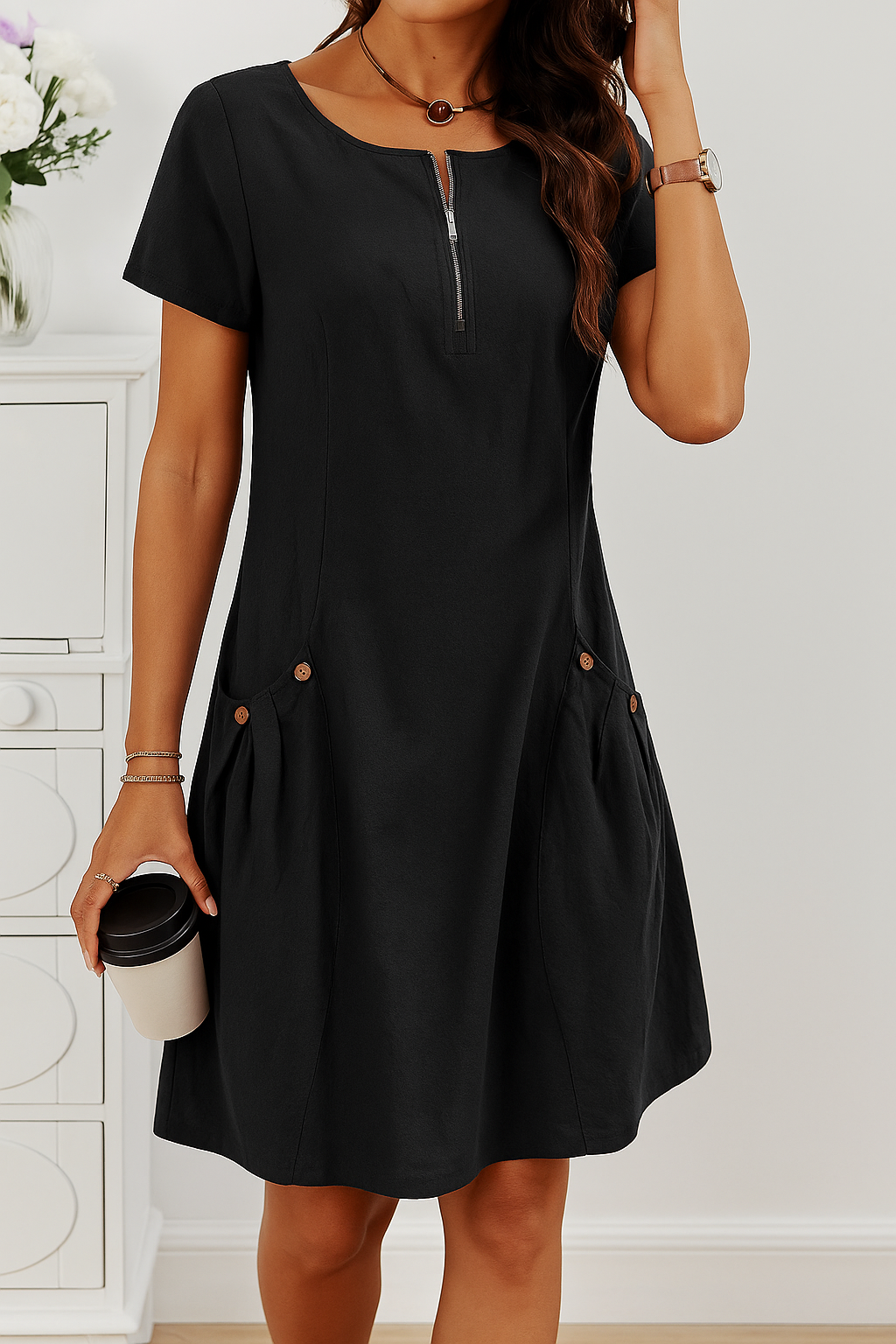 Elegant women's A-line day dress with charming button details down the front, perfect for a sunny day out.