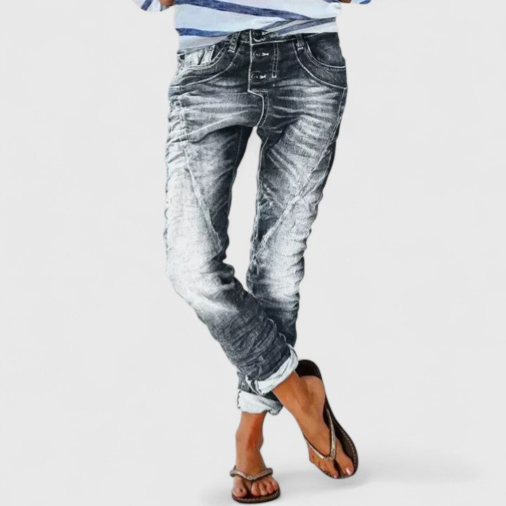 Women's acid wash skinny denim jeans, slim fit, with a button fly and standout contrast stitch details.