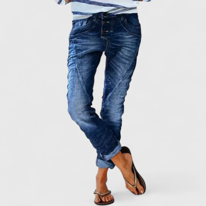 Fashionable women's acid wash skinny jeans, slim fit, featuring unique contrast stitch and button fly design.