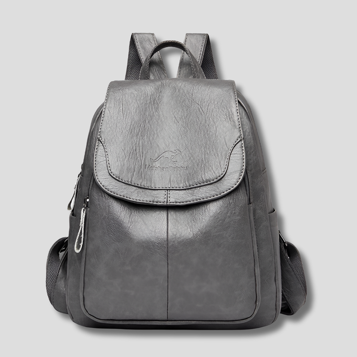 Versatile women's anti-theft backpack, functions as a stylish shoulder bag or travel pack. Secure leather-look design.