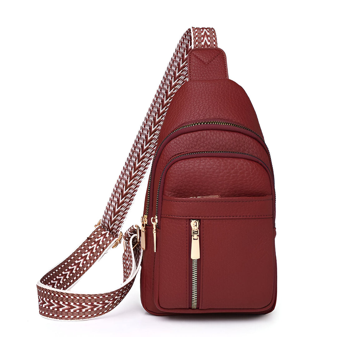 Fashionable women's sling backpack, an anti-theft crossbody bag with a decorative strap for secure and stylish travel.
