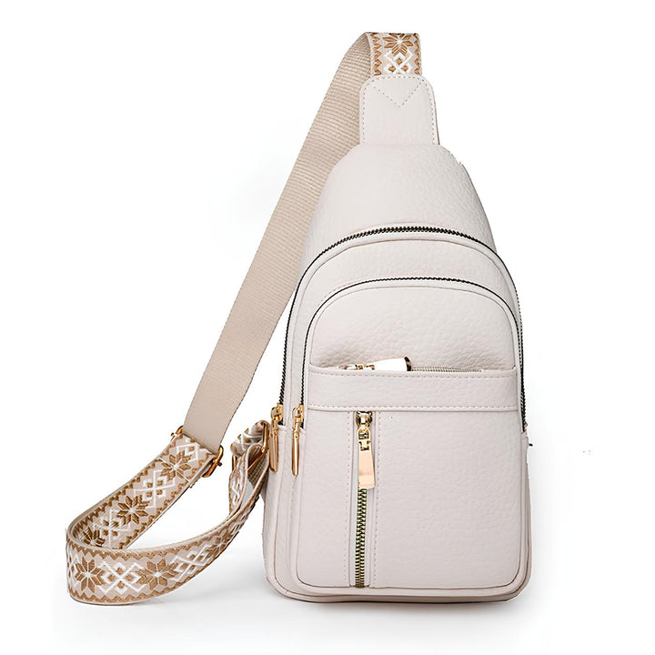 Stylish women's crossbody sling bag with unique patterned strap. Compact, anti-theft, perfect for daily use & travel.