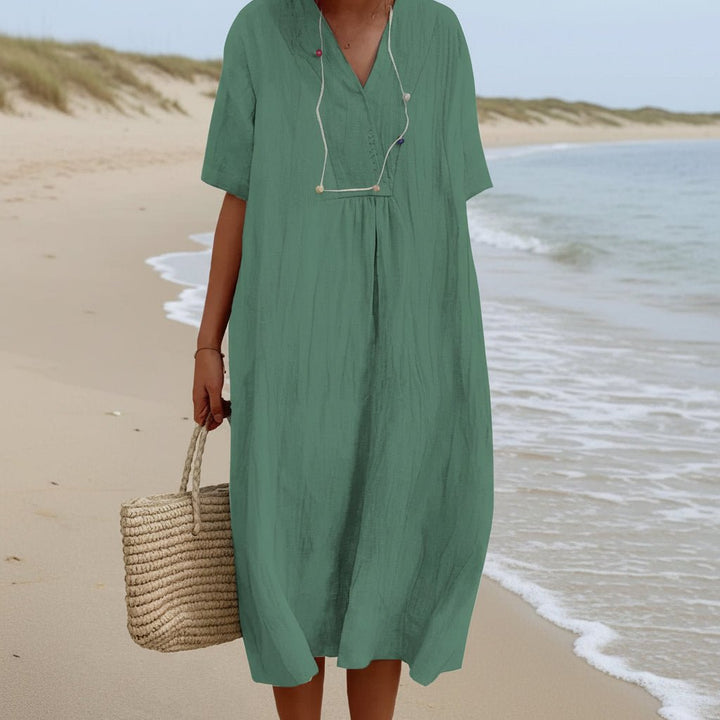 Women's Aria summer dress: A-line midi, V-neck, pockets. Flowy and comfortable for casual wear or beach vacation.