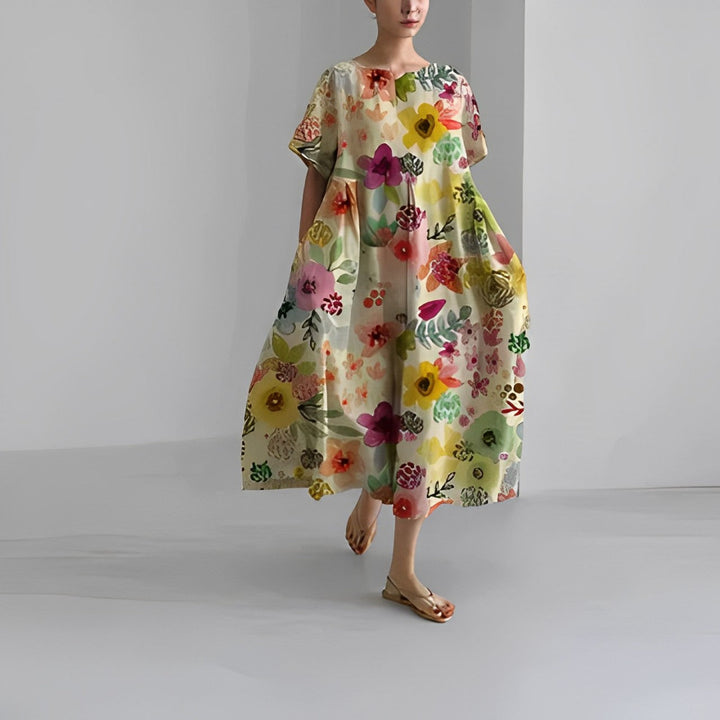 Women's artistic print midi dress, relaxed fit, short sleeve. A comfortable, casual, and stylish summer wardrobe essential.