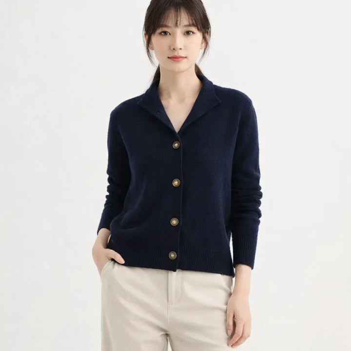 Versatile women's asymmetrical knit cardigan with button placket, great for elegant fall/winter style.