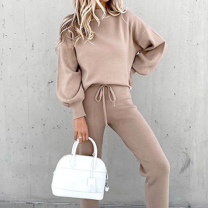 Close-up on sleeve cuff & soft texture of women's plush loungewear set, emphasizing comfort.