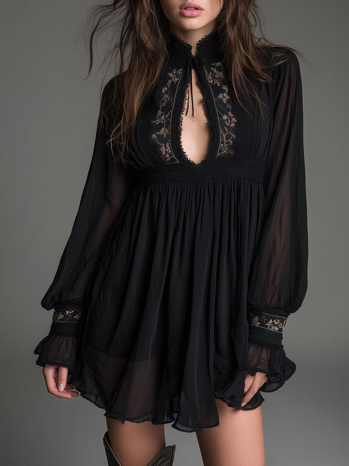 Women's black babydoll mini dress with high neck keyhole and elegant balloon sleeves. Perfect for parties & date nights.