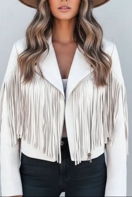 Women's fringed moto jacket, available in black, pink, white, and orange. Edgy outerwear for a bold style.