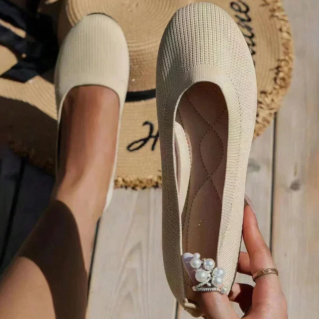 Pair of women's navy orthopedic comfort ballerinas with arch support, ideal for all-day wear.
