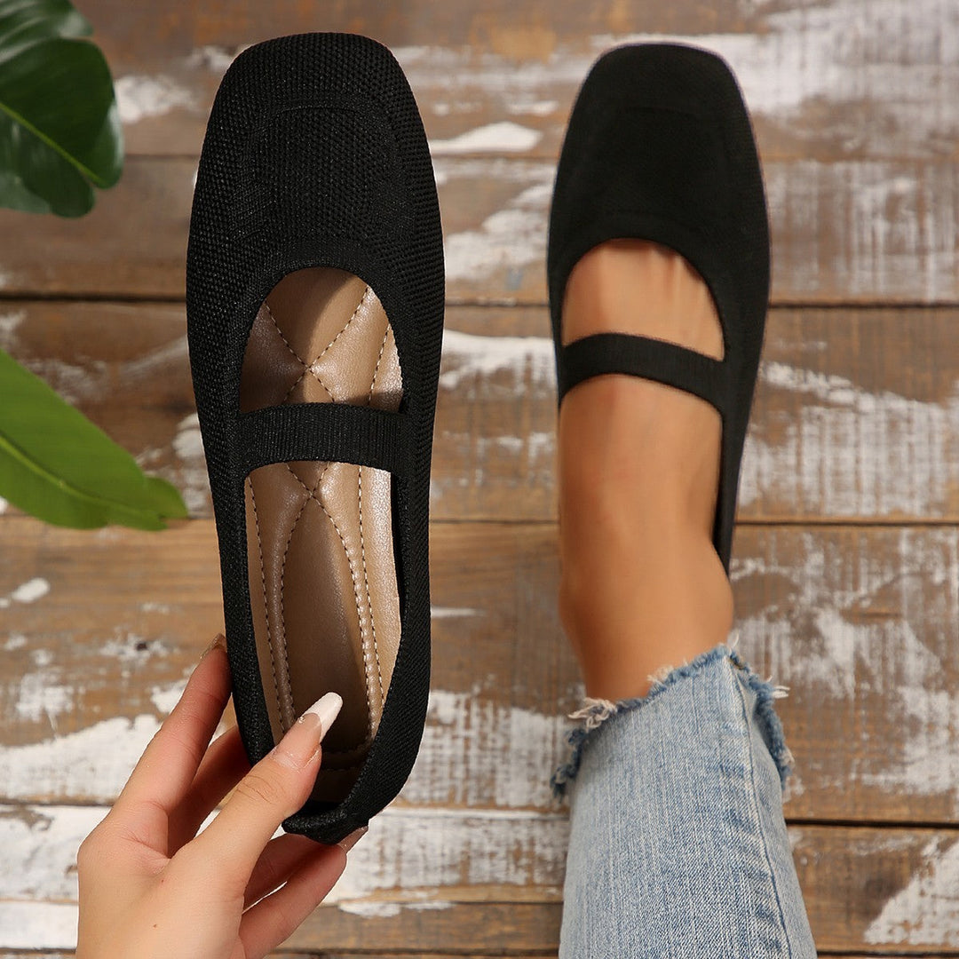 Women's black smiling face Mary Jane ballet flats, perfect for comfortable everyday casual wear.