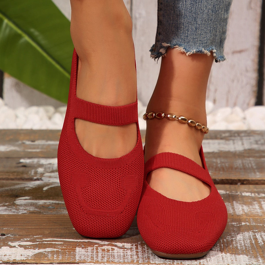 Comfortable women's ballet flats with an iconic smiling face, stylish and casual for everyday wear.