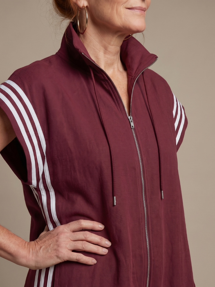 Casual women's jumpsuit, zip front closure, high neck, and sporty side stripes. Relaxed fit, perfect for summer.