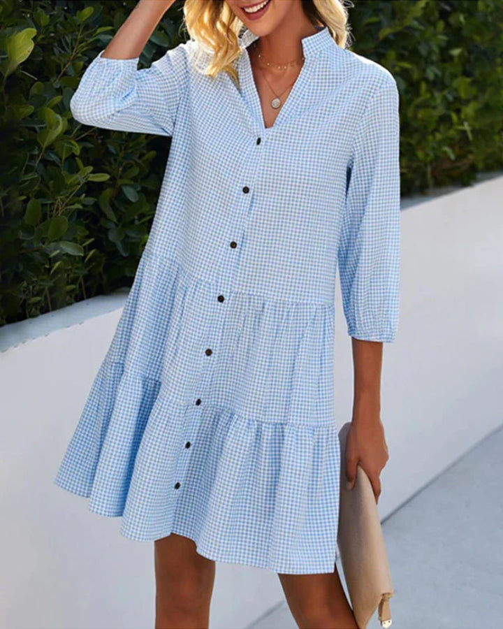 Women's blue check summer dress, short sleeve, tiered design, and button-down front. Effortless style & comfort.