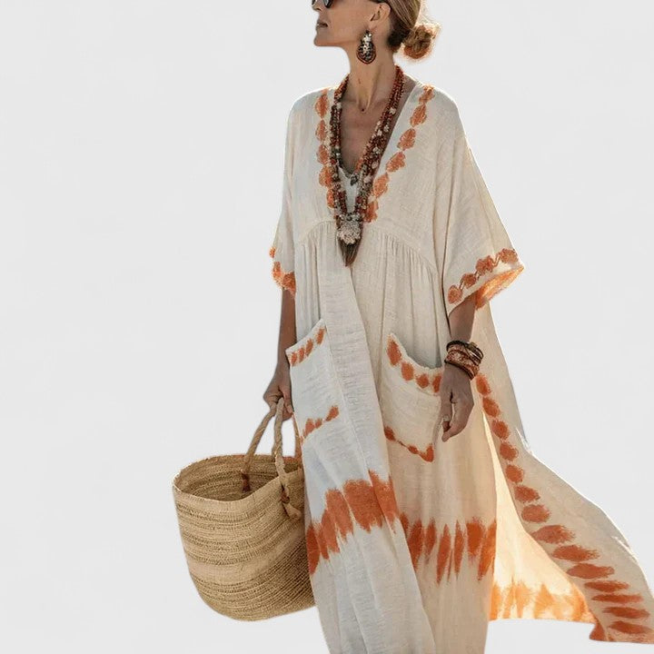 Relaxed fit women's maxi dress with pockets, comfortable for everyday wear and travel.
