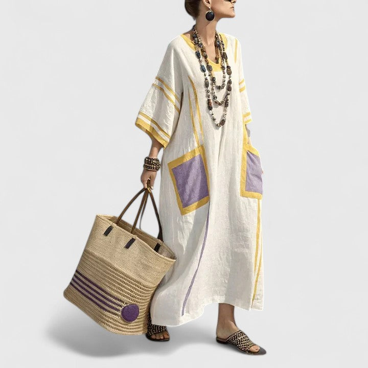 Lightweight, flowy women's bohemian maxi dress with pockets, perfect for summer fashion.