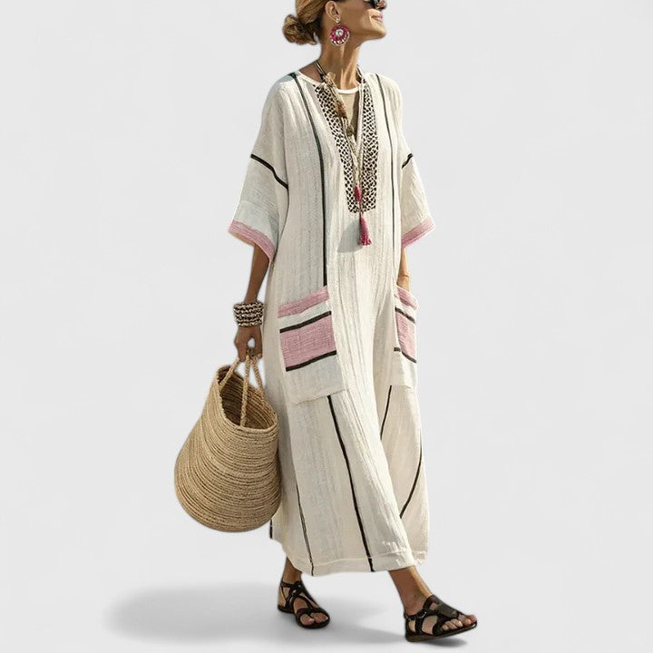 Elegant women's bohemian maxi dress, suitable for a relaxed vacation look or beach day.