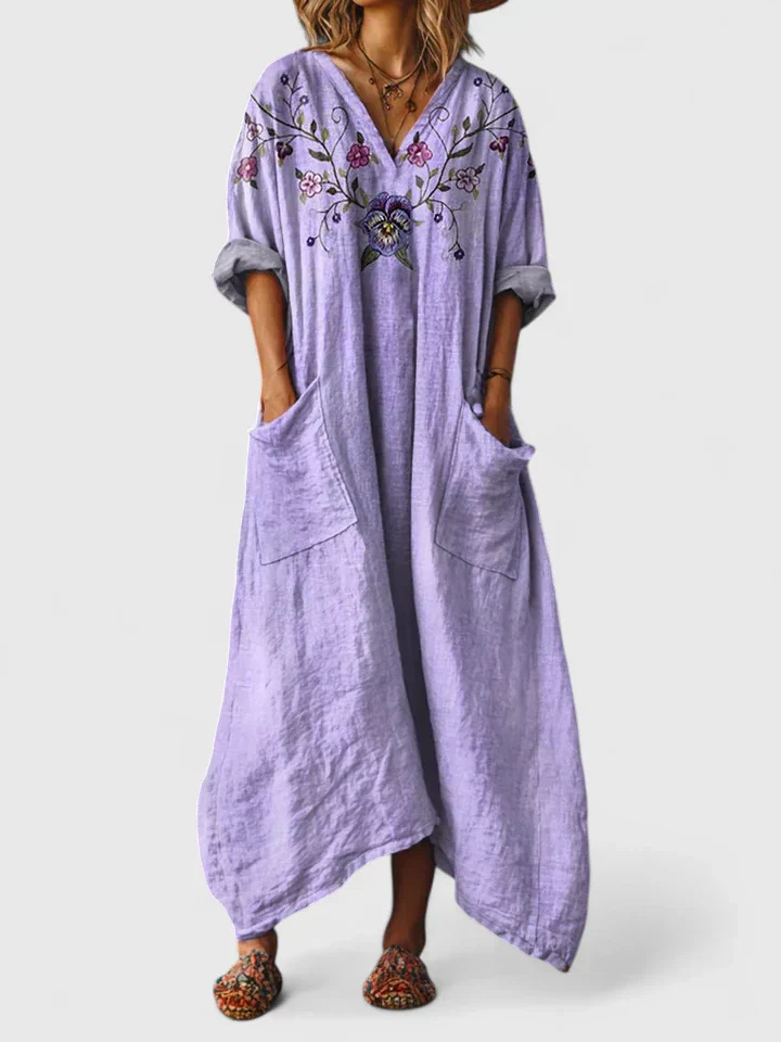 Trendy women's bohemian wide-leg printed jumpsuit with V-neck and pockets, perfect for casual summer wear.