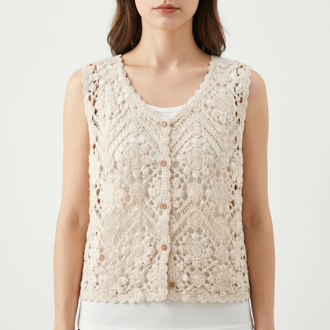 Bohemian women's sleeveless summer vest with floral print, ideal for casual layering or beachwear. Relaxed fit top.