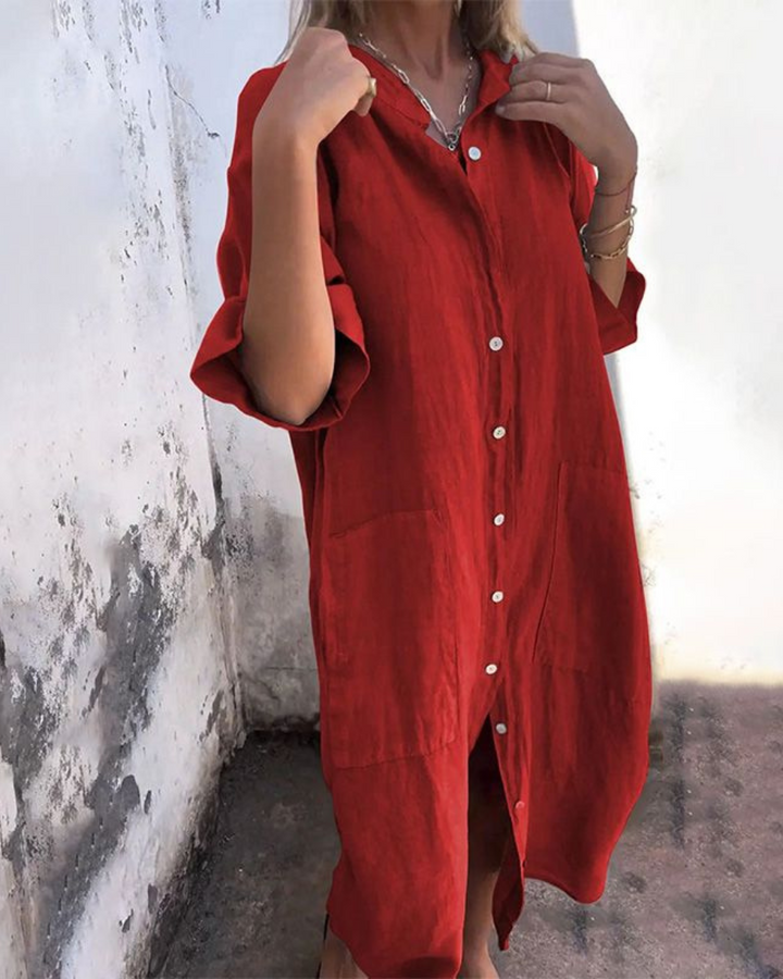 Full-length women's floral button-down maxi dress, showcasing its flowy silhouette & vibrant boho design.