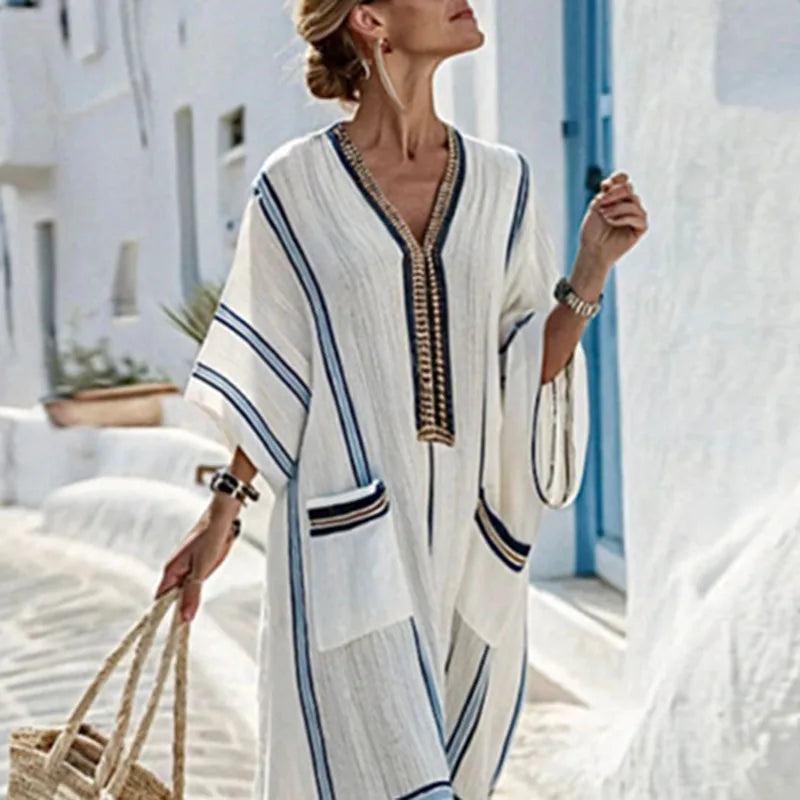 Striped V-neck women's maxi dress, boho style. Perfect flowing long summer dress for casual wear or beach.